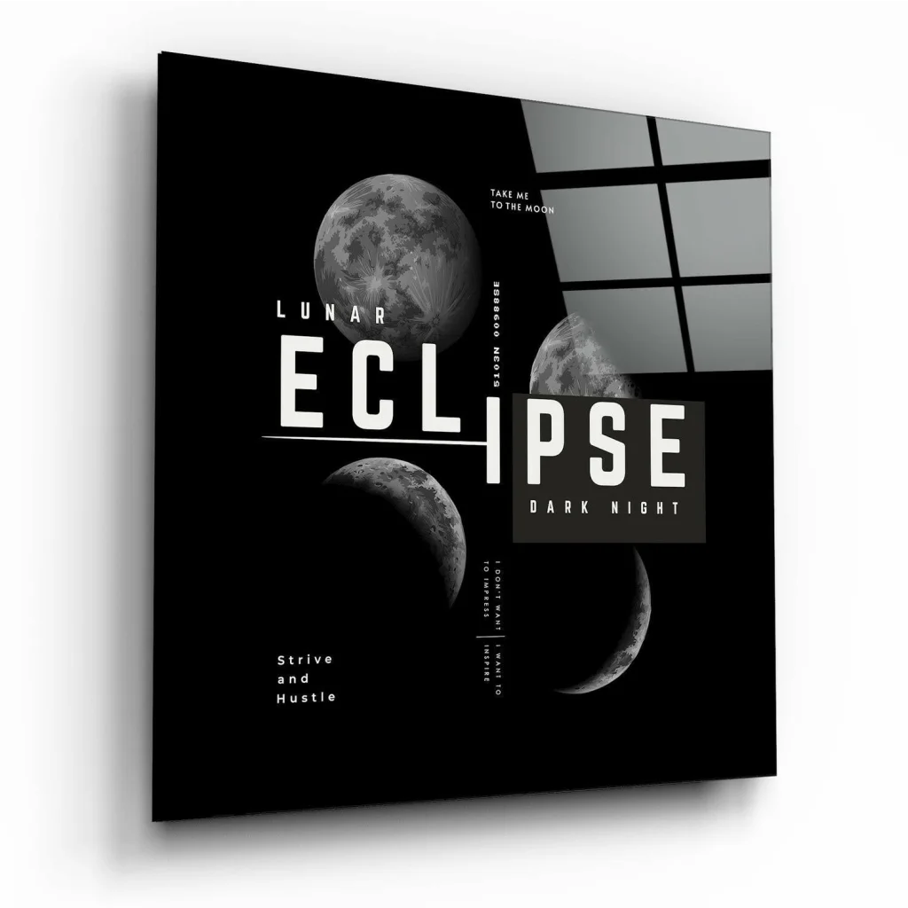 Bold black and white lunar eclipse glass wall art with moon phases