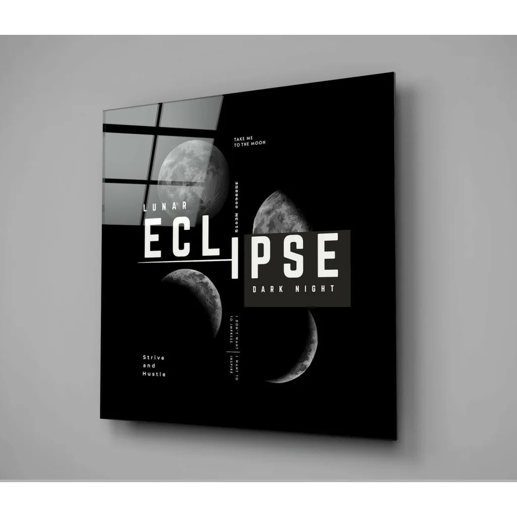 Black and white lunar eclipse glass wall art with bold moon phases