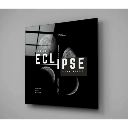 Black and white lunar eclipse glass wall art with bold moon phases