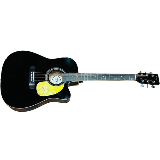 Ed Sheeran black acoustic guitar with yellow pickguard and autograph