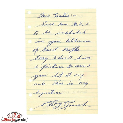 1956 handwritten note on yellow legal pad with blue ink signature