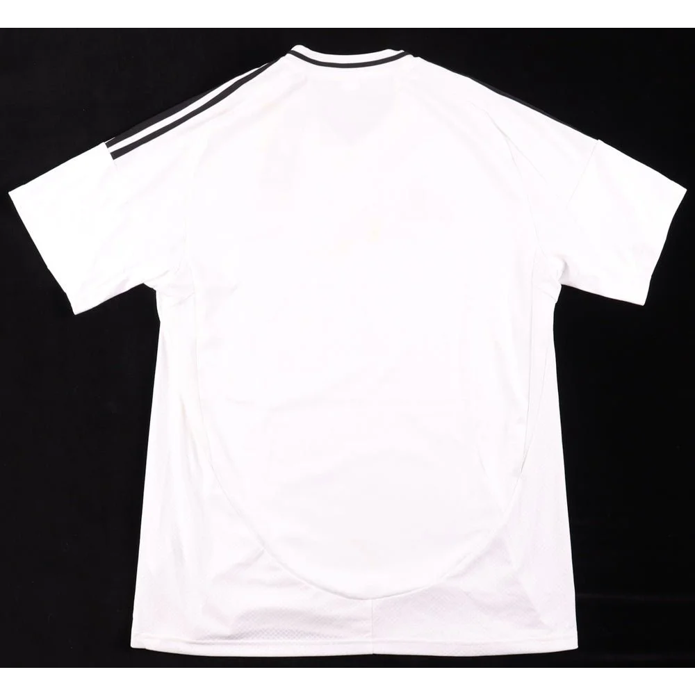 White short-sleeve T-shirt with black stripes and collar, perfect for Real Madrid fans