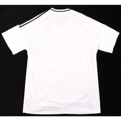 White short-sleeve T-shirt with black stripes and collar, perfect for Real Madrid fans