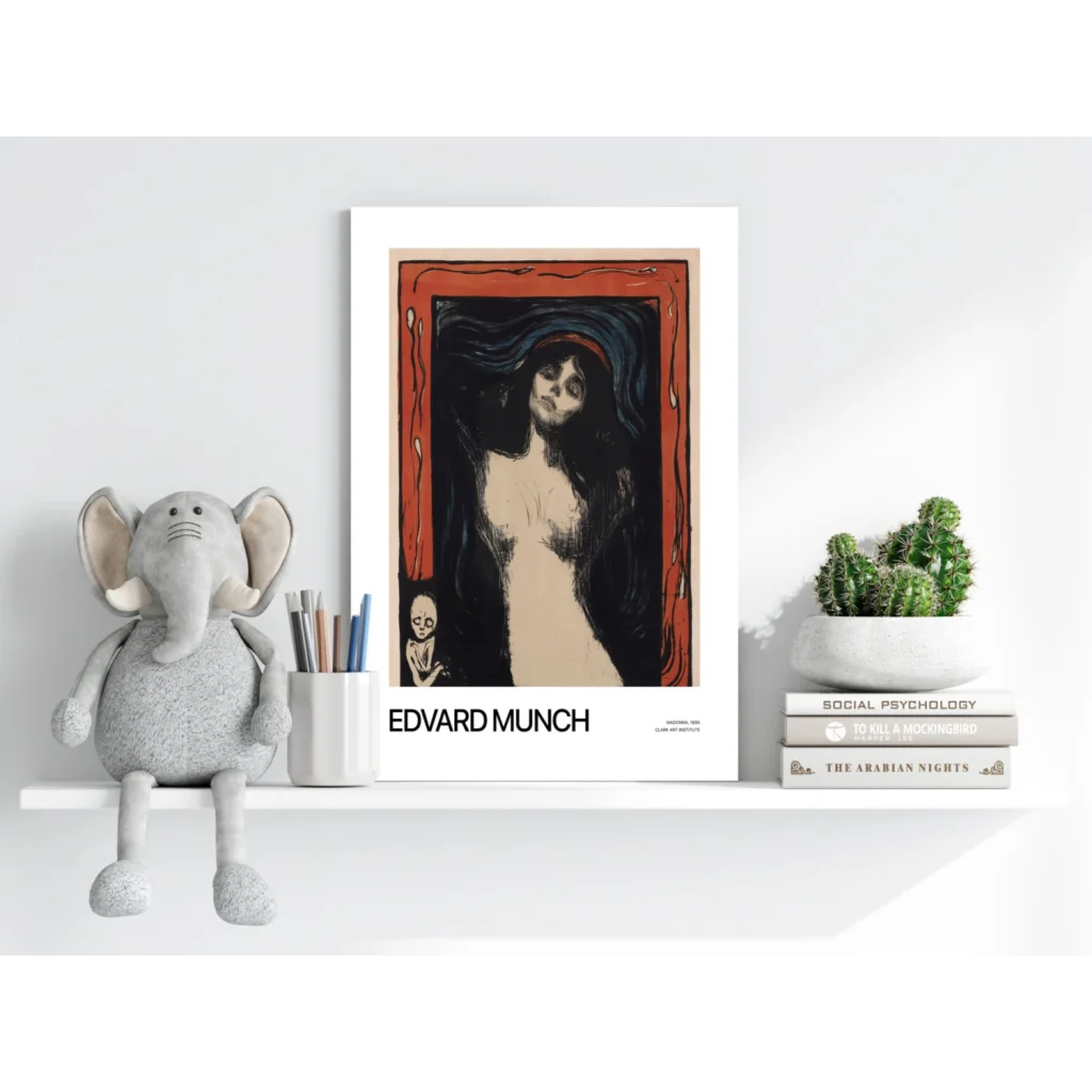 Gray plush elephant toy with floppy ears on Edvard Munch framed print shelf