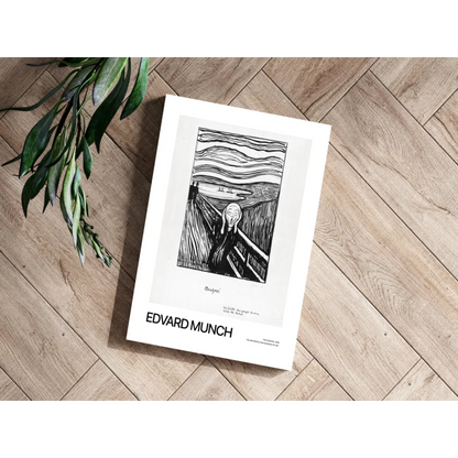 Edvard Munch The Scream print in white frame on wood floor