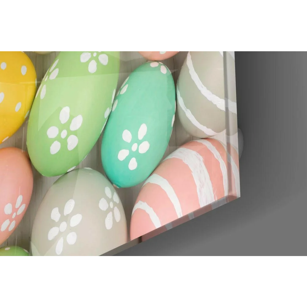 Pastel easter eggs with floral patterns in glass wall art display