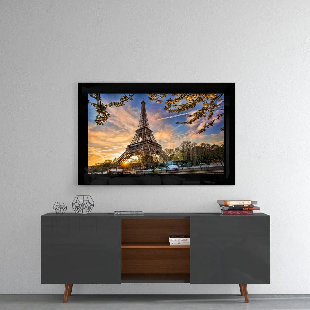 Eiffel Tower sunset glass wall art with cherry blossoms and golden light
