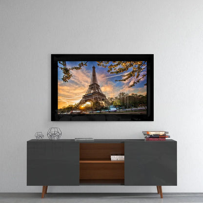Eiffel Tower sunset glass wall art with cherry blossoms and golden light