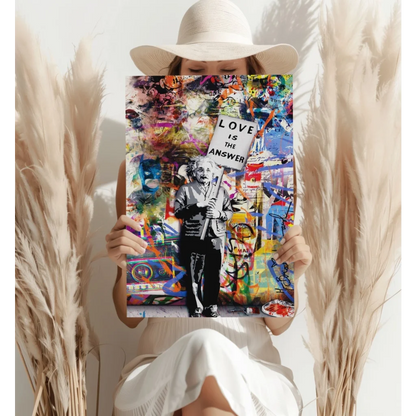 Vibrant graffiti Einstein canvas print with love is the answer sign