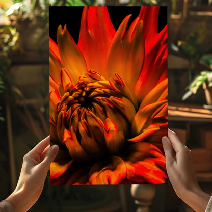 Vibrant orange red dahlia print on insigne aluminum, held by hands