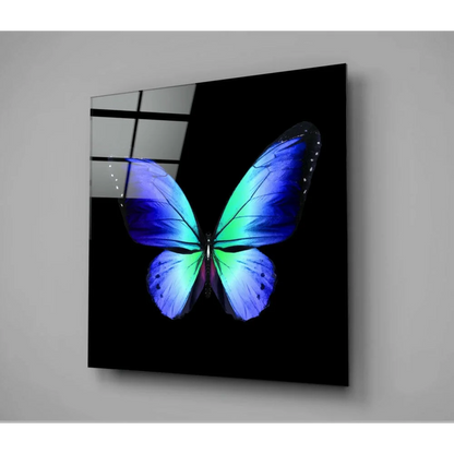 Vibrant blue green butterfly glass wall art on sleek black panel