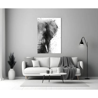 Black-and-white abstract elephant glass wall art above white sofa