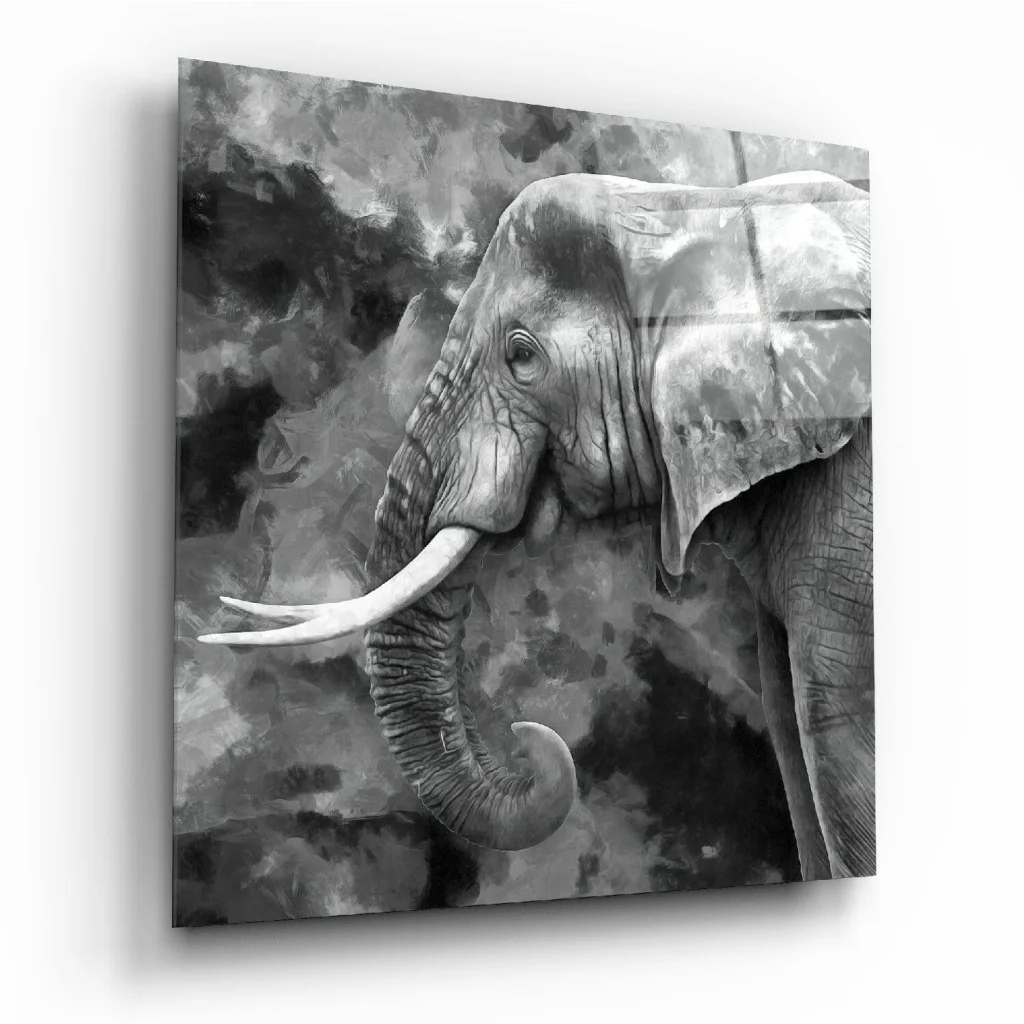 Detailed black-and-white elephant glass wall art with textured tusks and wrinkles