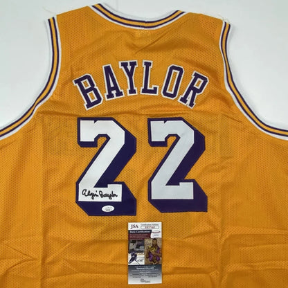 Yellow custom jersey with BAYLOR 22 signed by Elgin Baylor, perfect for sports fans