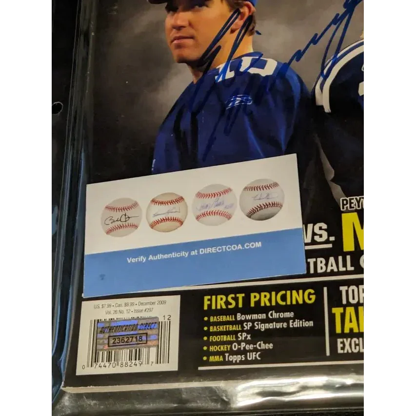 Eli Manning autographed memorabilia with baseballs and signed photo in autographed price guide