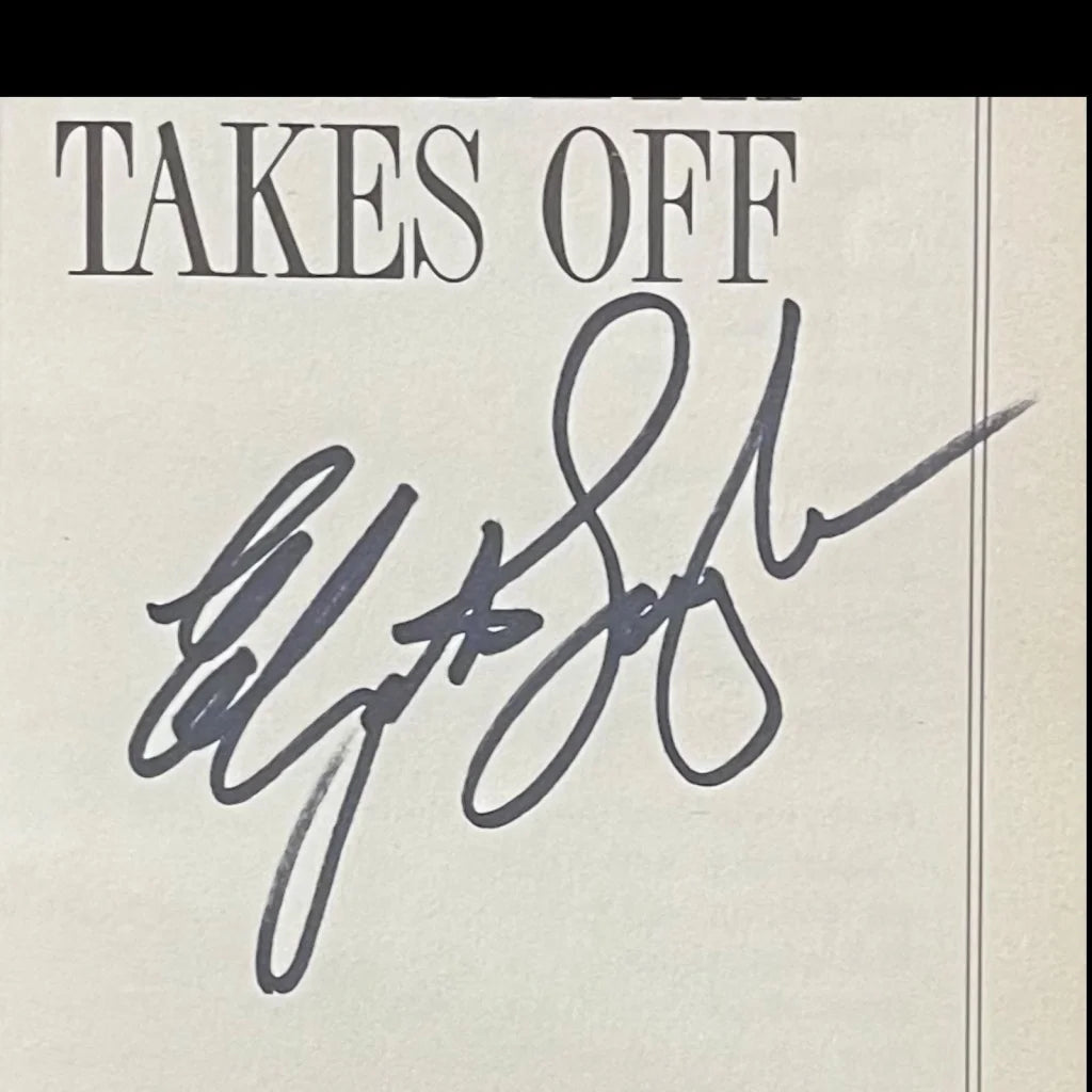 Elizabeth Taylor autographed book with black signature pen and JSA