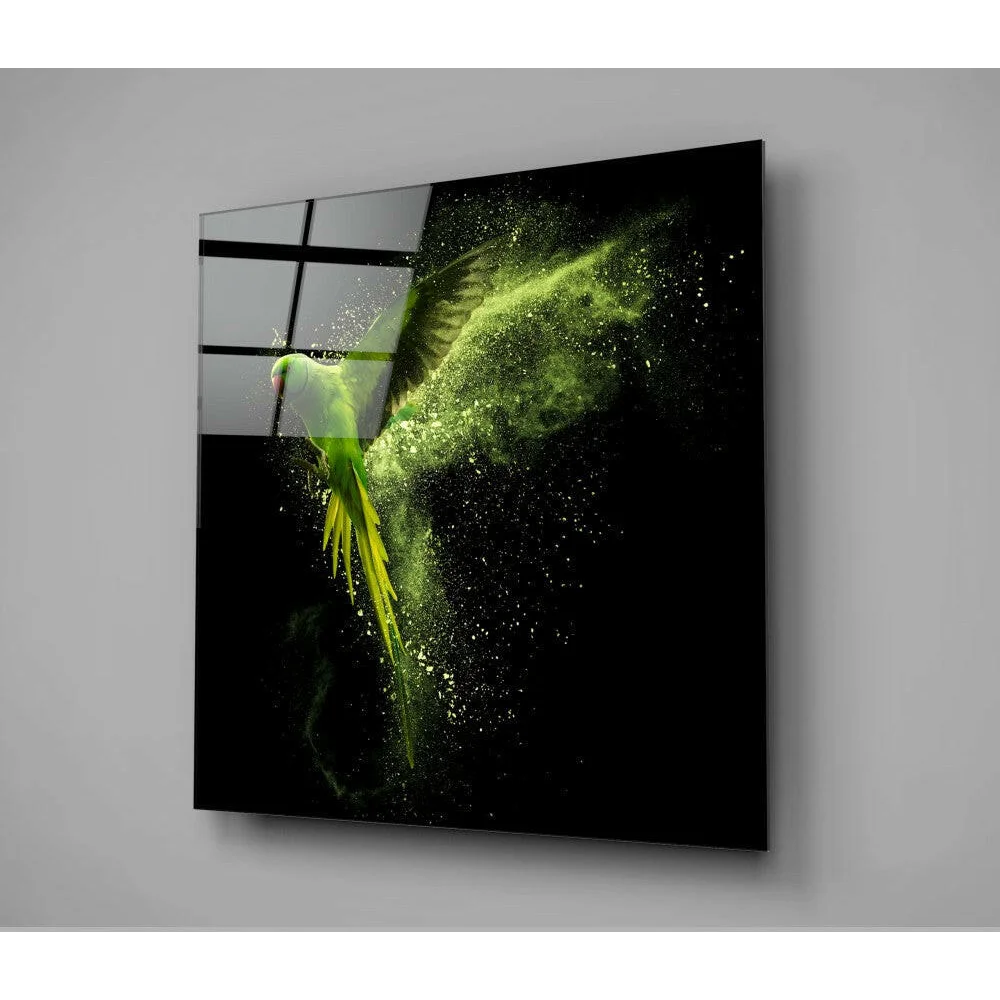 Vibrant emerald parrot in flight on glass wall art with golden accents