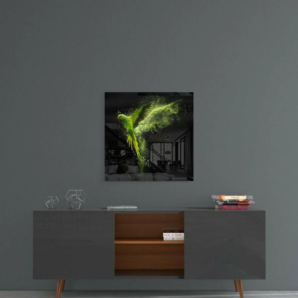 Vibrant emerald parrot glass wall art in flight with golden accents