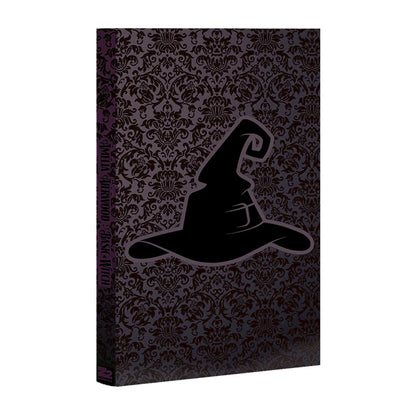 Dark purple Emily Hampshire limited edition graphic novel with black witch’s hat silhouette