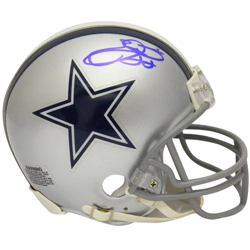 Silver dallas cowboys mini helmet with navy blue star logo and purple emmitt smith autographed signature on the side