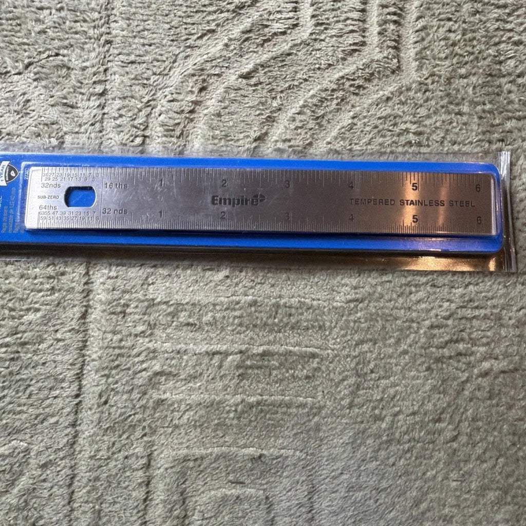 Empire 6-inch tempered stainless steel ruler in blue plastic wrap