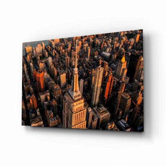 Golden hour aerial NYC view with Empire State Building glass wall art