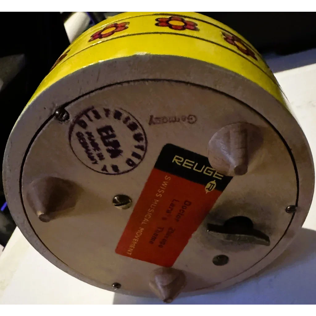 Yellow floral Reuge music box from Enchanting Reuge Music Box Soldier plays melodies