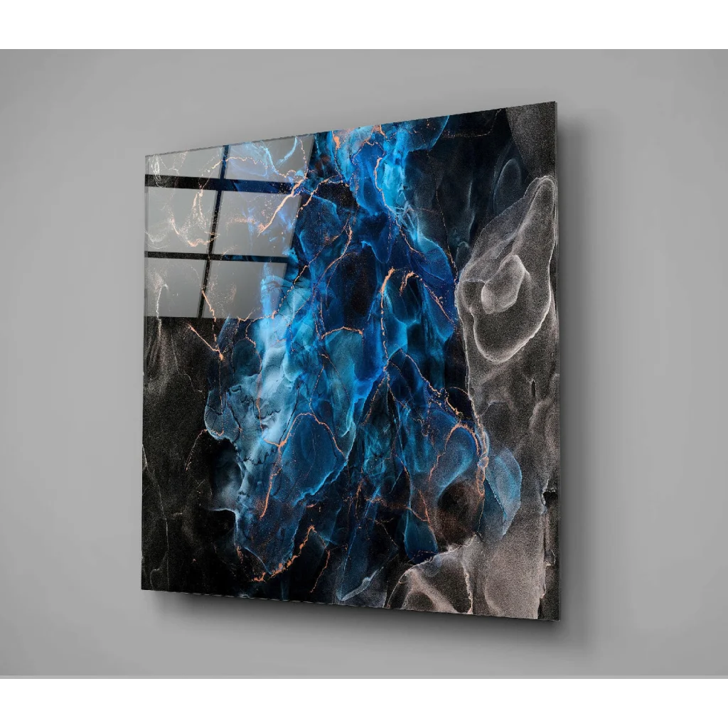 Vibrant blue and black glass wall art with gold metallic veins