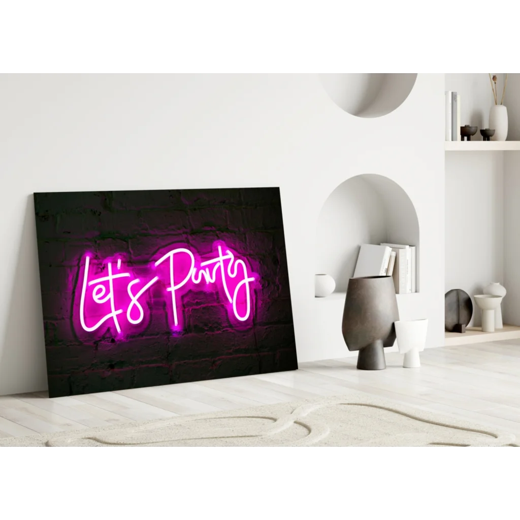 Vibrant pink neon lets party cursive glass wall art sign on black canvas