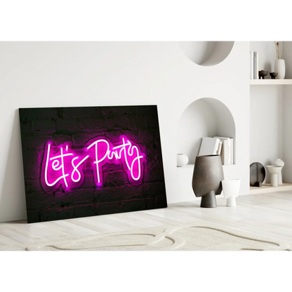 Vibrant pink neon lets party cursive glass wall art sign on black canvas