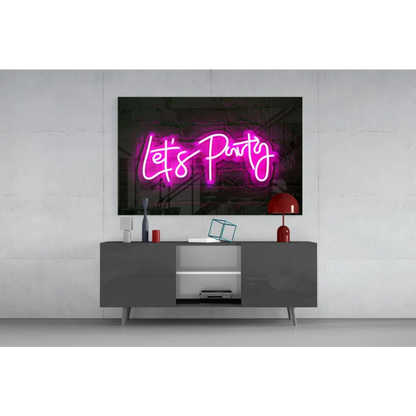 Vibrant pink neon lets party cursive sign on glass wall art