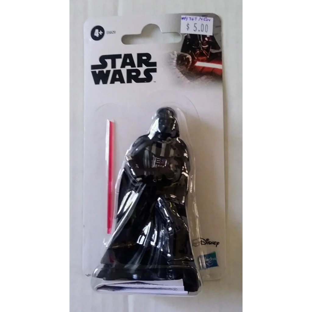 Black Darth Vader Star Wars figure with red lightsaber in branded packaging