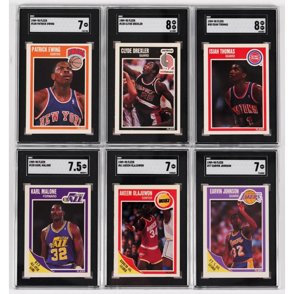 A collection of six graded Fleer basketball cards from 1989-90 featuring top players