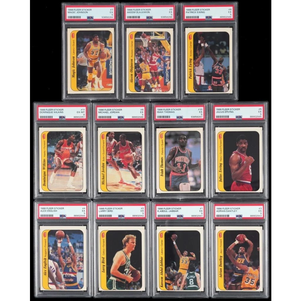 Image of a fleer graded card collection with 12 1986 NBA stickers of Jordan, Magic, Bird