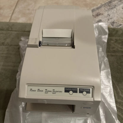 Beige Epson TM-U375P dot matrix POS receipt printer with compact design