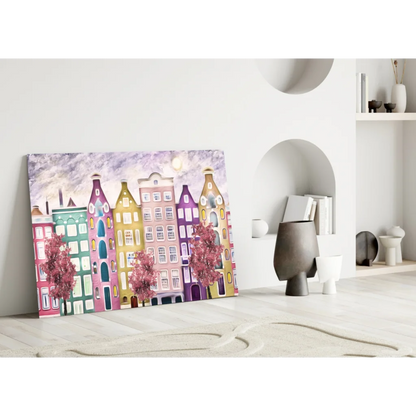 Vibrant European canal houses with pink trees canvas wall art