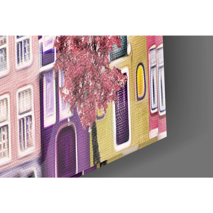 Vibrant pink tree canvas wall art with European canal houses