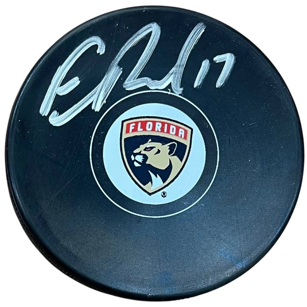 Evan Rodrigues autographed black Florida Panthers hockey puck