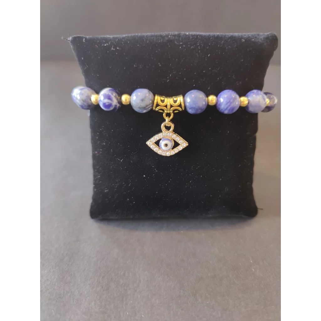 Evil eye charm sodalite beaded bracelet with lavender beads and gold accents
