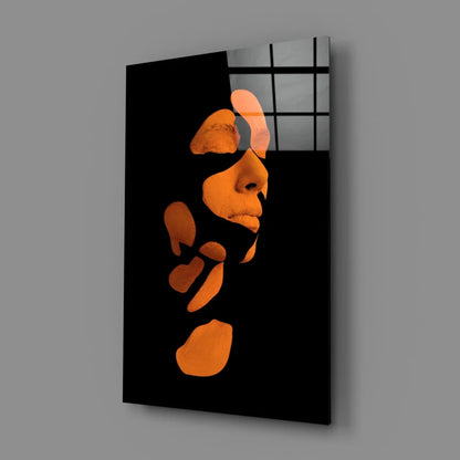 Stunning orange abstract face glass wall art on black canvas