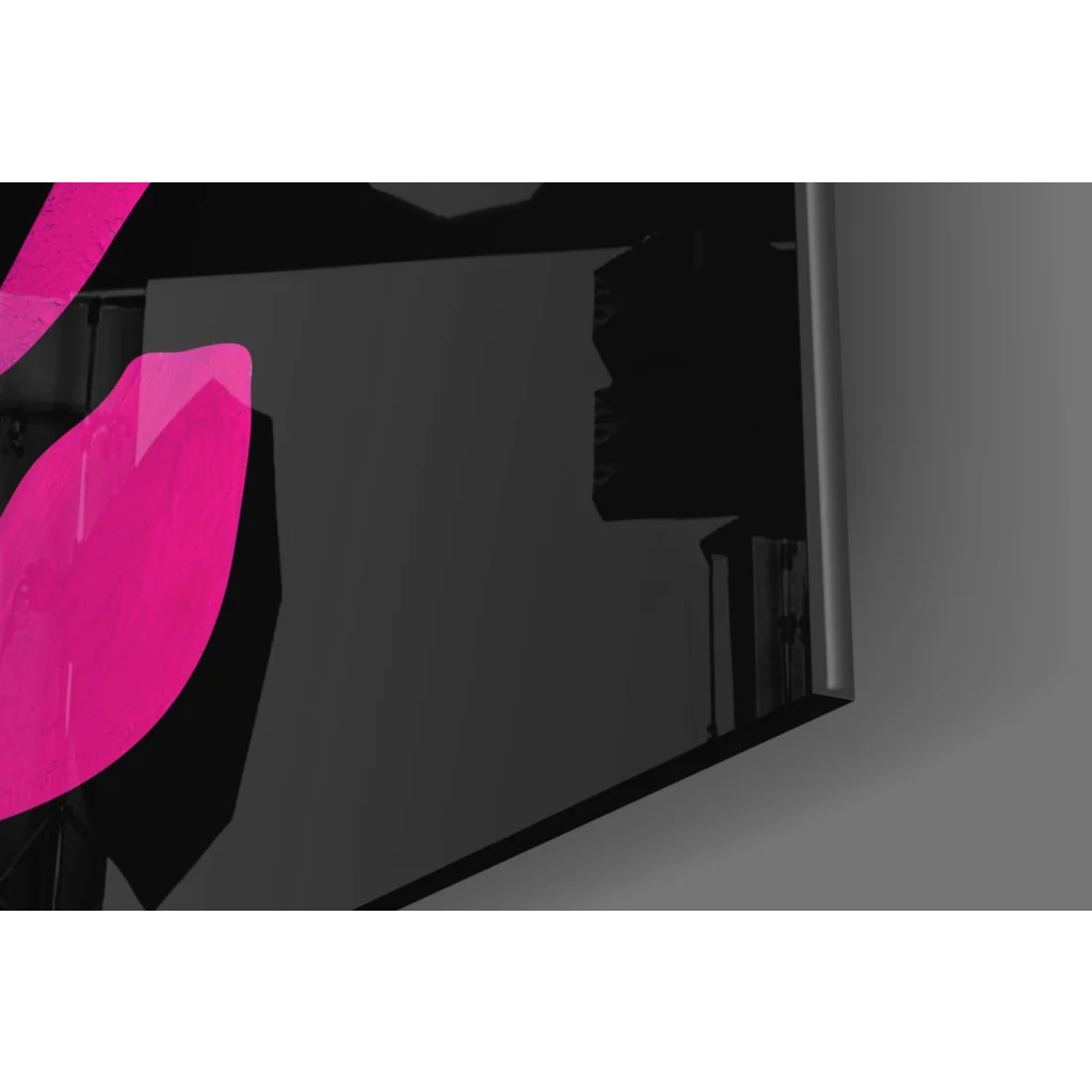Vibrant pink glossy leaf on sleek black glass wall art display