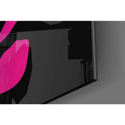 Vibrant pink glossy leaf on sleek black glass wall art display
