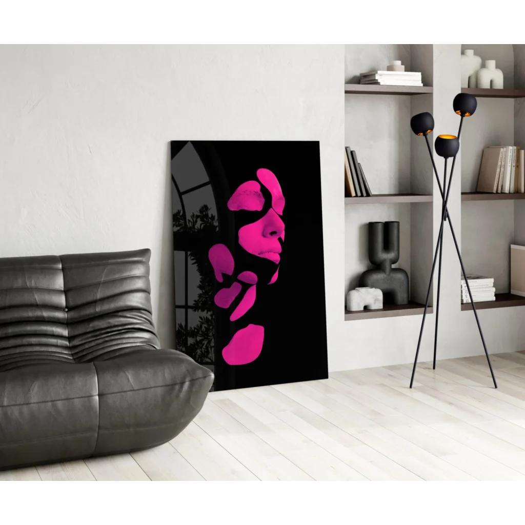 Vibrant pink abstract face glass wall art on sleek black canvas