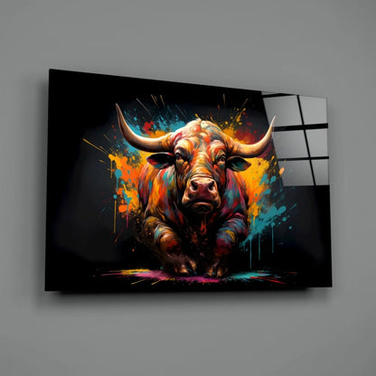 Vibrant explosive bull glass wall art with bold orange, blue, yellow splashes