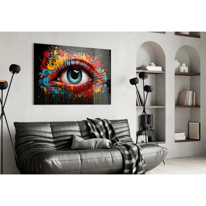 Vibrant pop art eye glass wall art with bold red blue yellow splatters on black