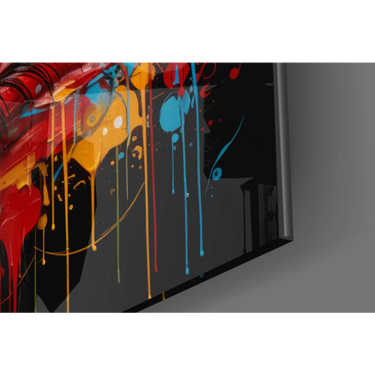 Vibrant explosive pop art glass wall art with red blue yellow splatters on black
