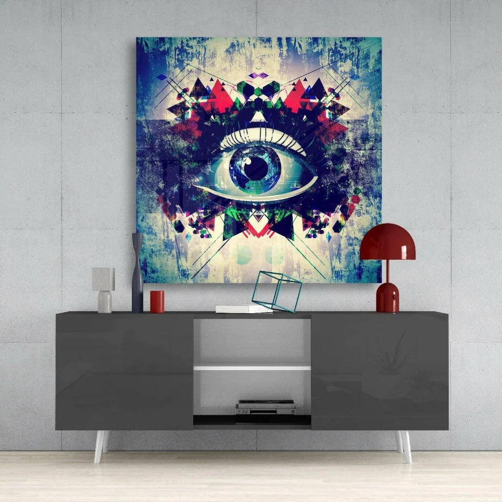 Vibrant abstract eye on glass wall art in blue, red, green geometric patterns