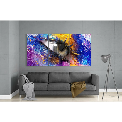 Mesmerizing eye abstract triptych canvas wall art with swirling purple, blue, yellow, orange hues and central silver reflection