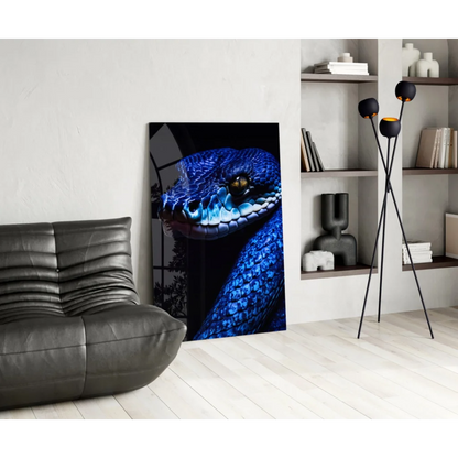 Stunning blue snake glass wall art with vibrant glossy scales and golden eye detail