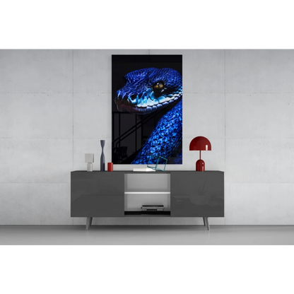 Stunning blue snake glass wall art with golden eyes on canvas